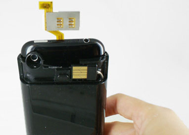 Fold adapter over the top of the phone and attach cover
